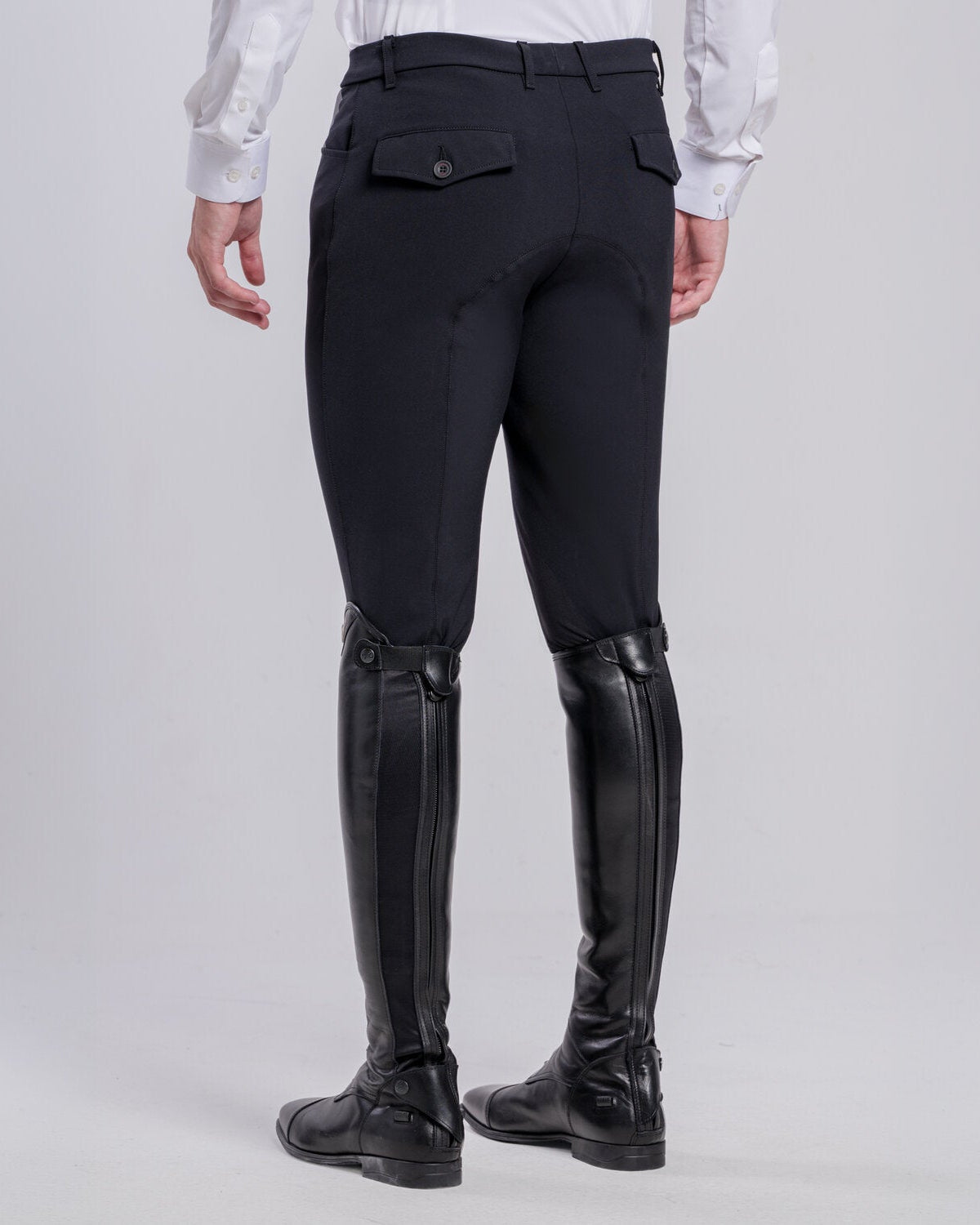 Rear view of Cavalleria Toscana CT Mens Revolution Breeches featuring a tailored fit, belt loops, front pockets, zip thigh pocket and contrasting ankle cuffs.