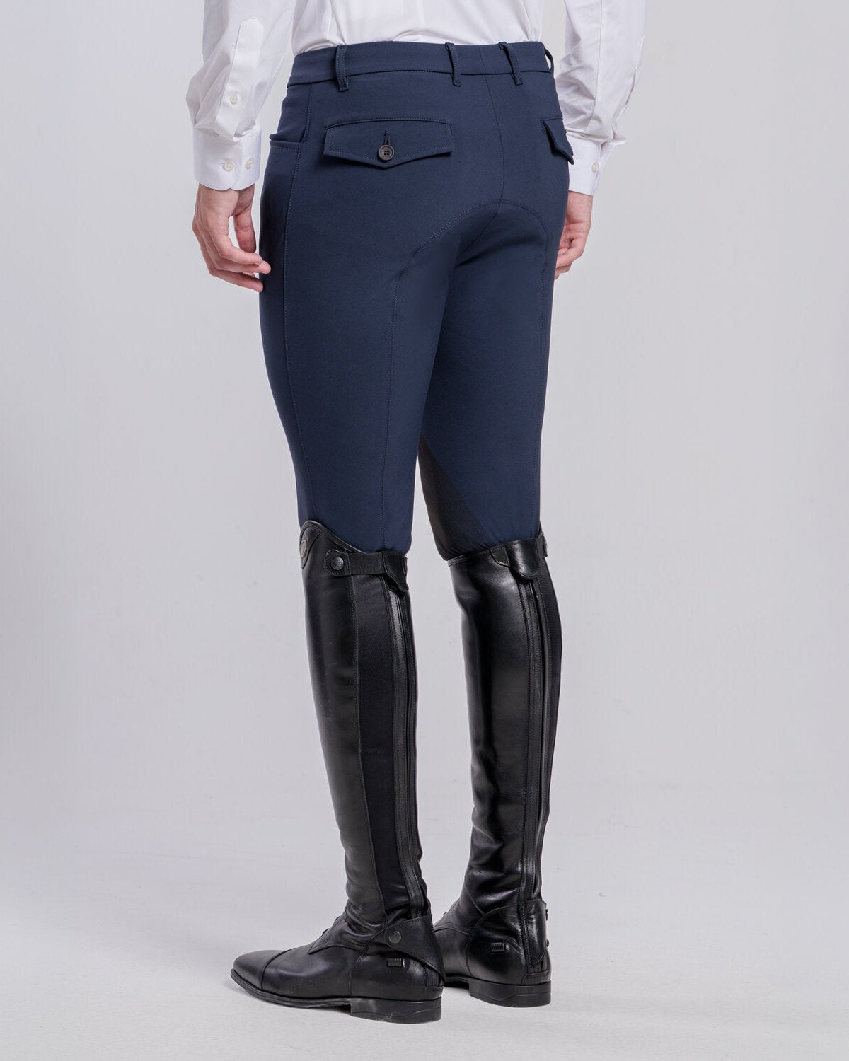 Rear view of Cavalleria Toscana CT Mens Revolution Breeches featuring a tailored fit, belt loops, front pockets, zip thigh pocket and contrasting ankle cuffs.