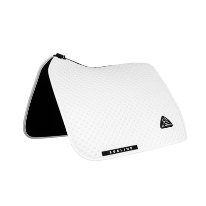 Sublime dotted dressage saddle pad in technical fabric.