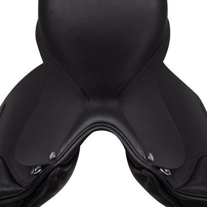 Dressage saddle with removable blocks