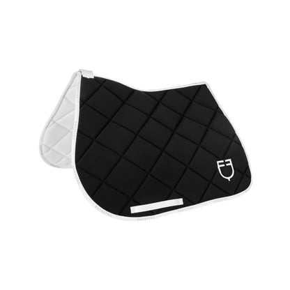 Jumping saddle pad technical fabric with logo.