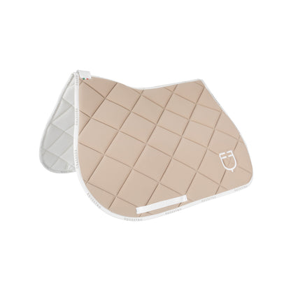 Jumping saddle pad technical fabric with logo.