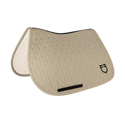 Jumping saddle pad cube quilting.