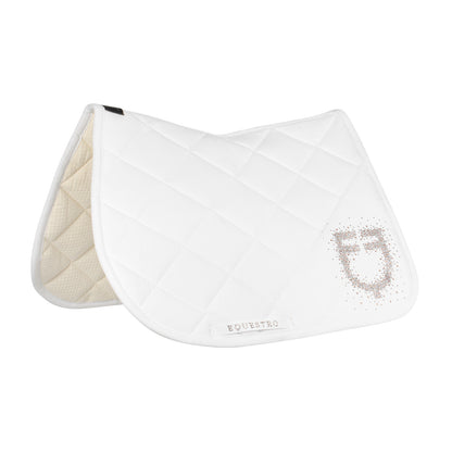 Jumping saddle pad with rhinestone logo.
