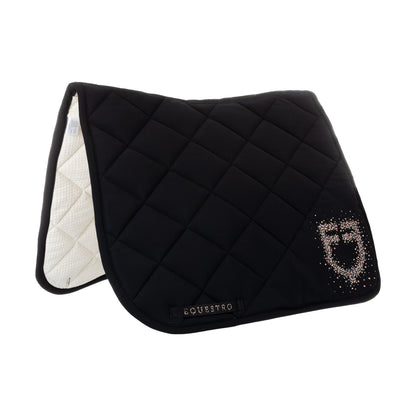 Dressage saddle pad with rhinestone logo.