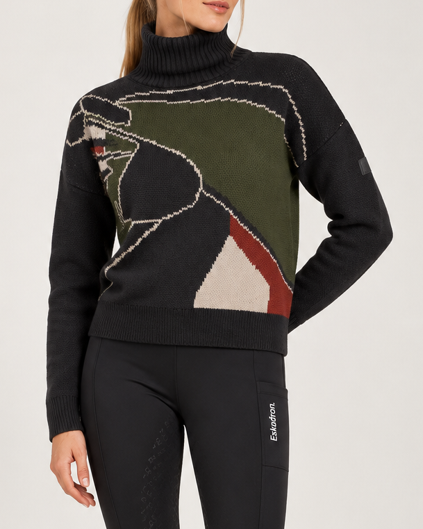 Eskadron Heritage 2026/27 ladies knitted turtleneck jumper in black with olive green and cream detailing, styled with black full grip riding breeches and tall brown leather riding boots.