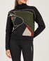 Eskadron Heritage 2026/27 ladies knitted turtleneck jumper in black with olive green and cream detailing, styled with black full grip riding breeches and tall brown leather riding boots.