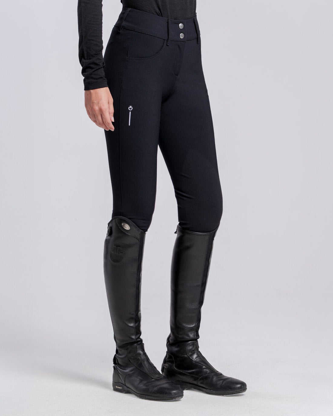 Cavalleria Toscana Ladies Revolution Knee Grip Riding Breeches PAD226 in navy blue, modelled with black tall riding boots, featuring a high waistband and CT logo.