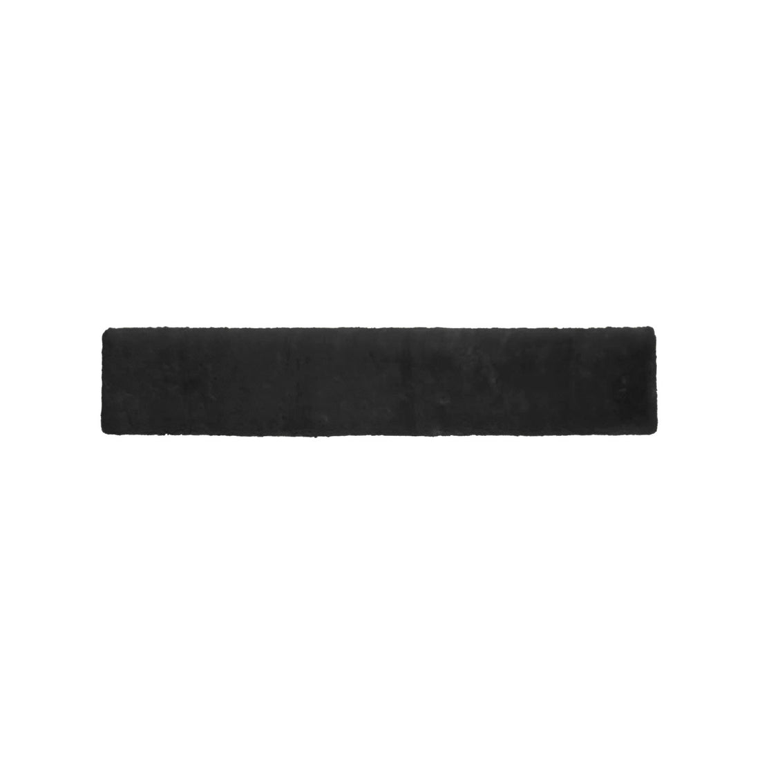 Synthetic sheepe skin girth cover.