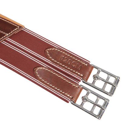 Jumping girth in leather with protectors