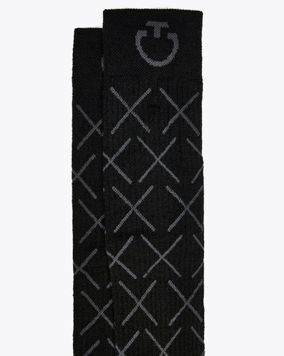 Close-up of Cavalleria Toscana CT Wool Riding Socks featuring an all-over geometric cross pattern, ribbed cuffs and signature CT logo detailing.