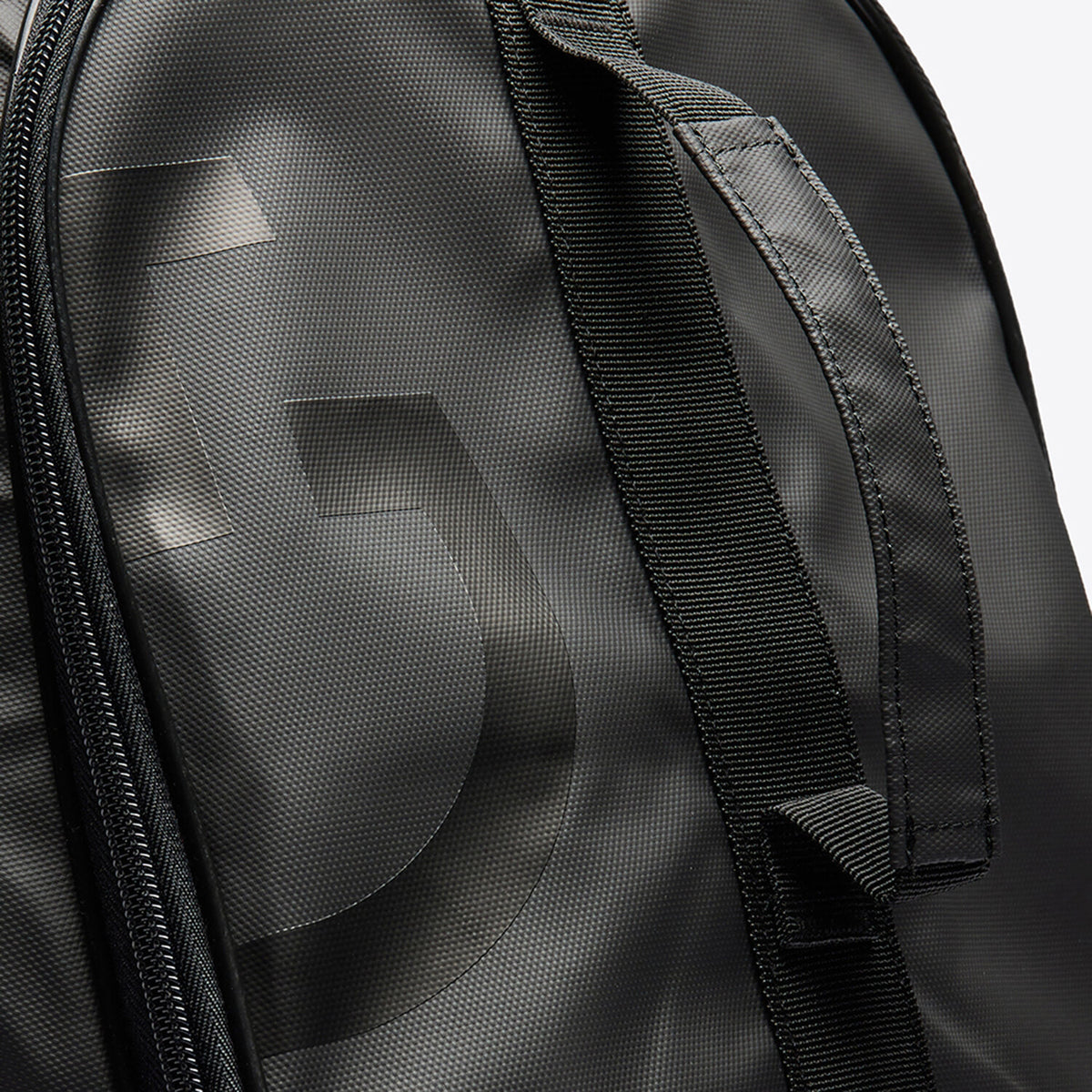 Close up of the Cavalleria Toscana CT Hold-All Backpack featuring a spacious zippered main compartment, external front pocket, carrying handle and oversized CT logo detailing.