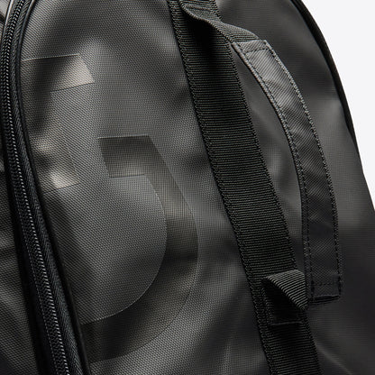 Close up of the Cavalleria Toscana CT Hold-All Backpack featuring a spacious zippered main compartment, external front pocket, carrying handle and oversized CT logo detailing.