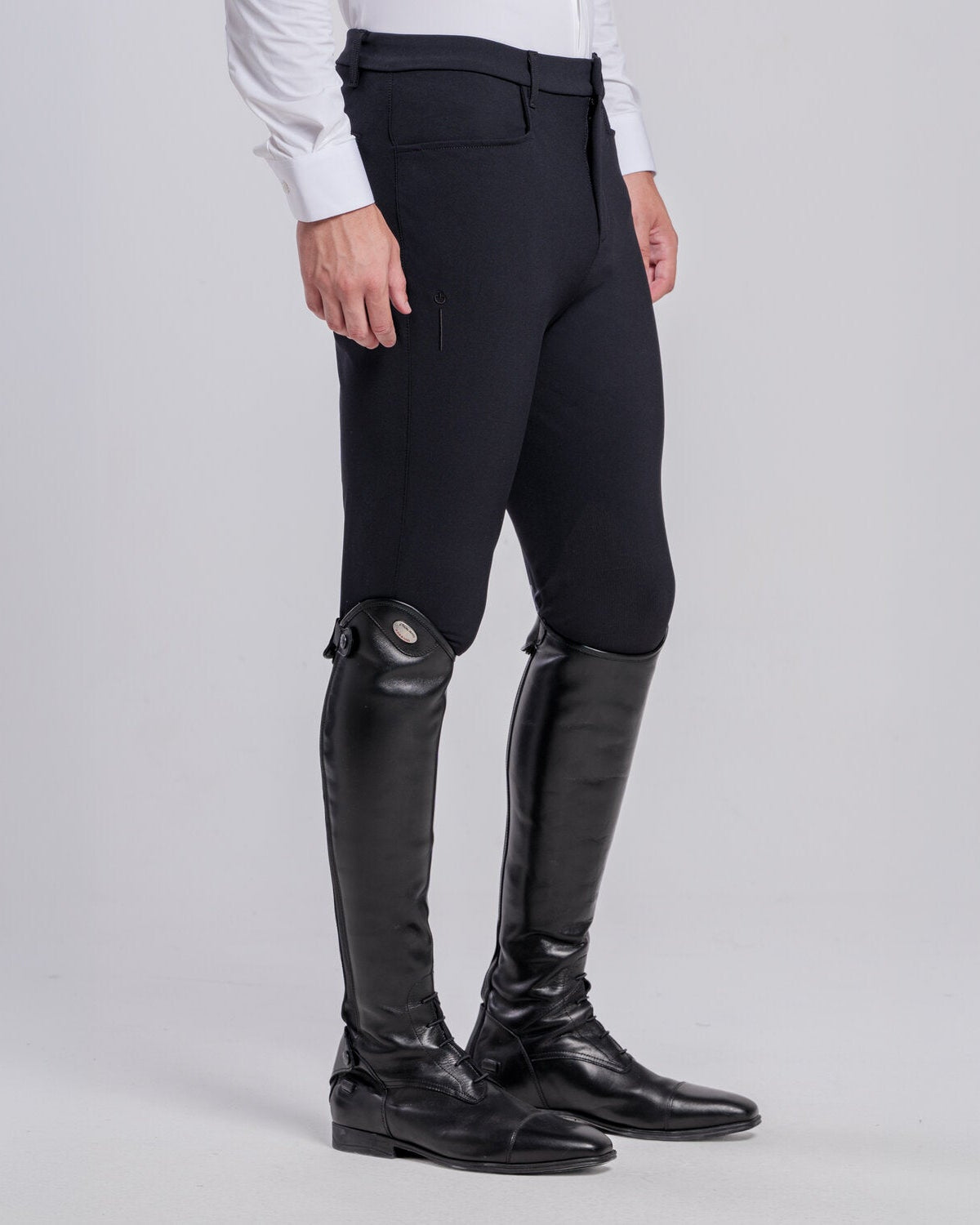 Side view of Cavalleria Toscana CT Mens Revolution Breeches featuring a tailored fit, belt loops, front pockets, zip thigh pocket and contrasting ankle cuffs.