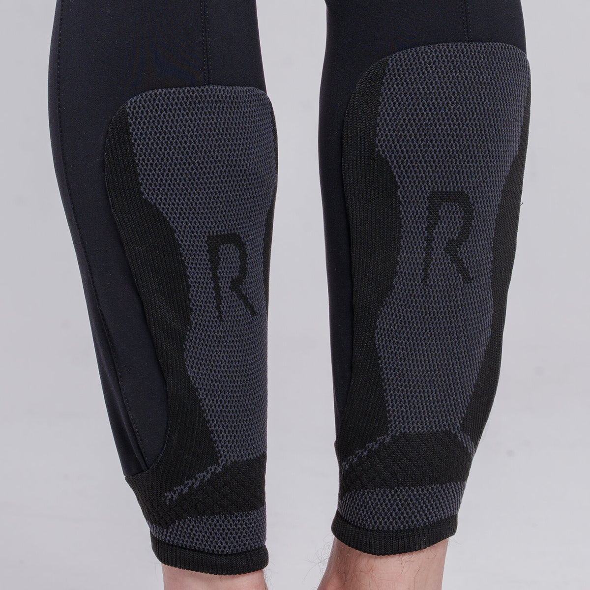Close up of Cavalleria Toscana CT Mens Revolution Breeches featuring a tailored fit, belt loops, front pockets, zip thigh pocket and contrasting ankle cuffs.