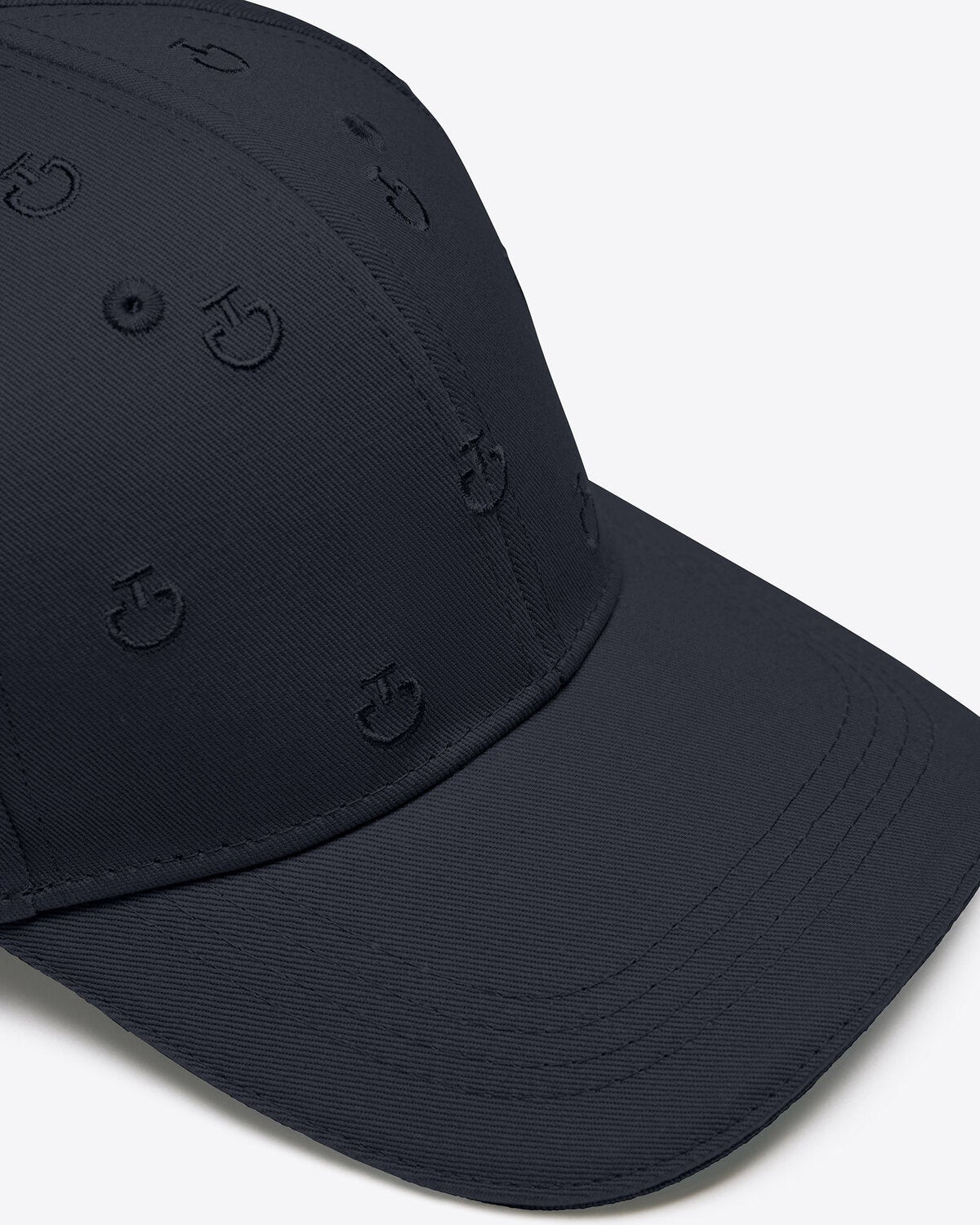 Close-up of the Cavalleria Toscana CT Cap With Logo, featuring an all-over embroidered CT logo pattern, structured panels and a curved stitched visor.