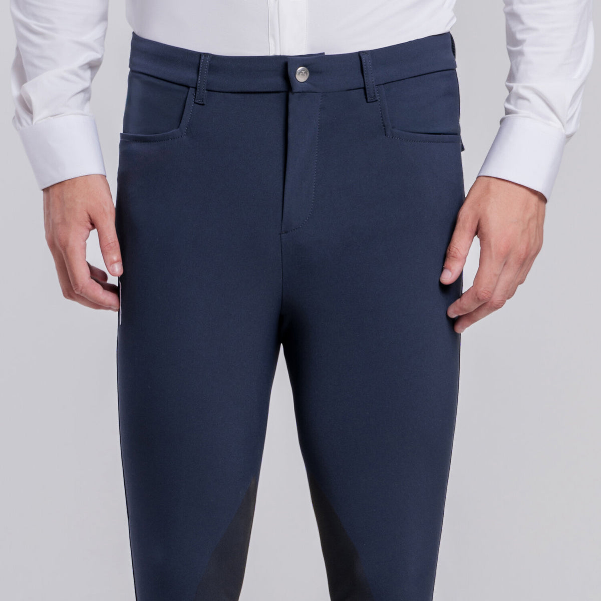 Front view of Cavalleria Toscana CT Mens Revolution Breeches featuring a tailored fit, belt loops, front pockets, zip thigh pocket and contrasting ankle cuffs.